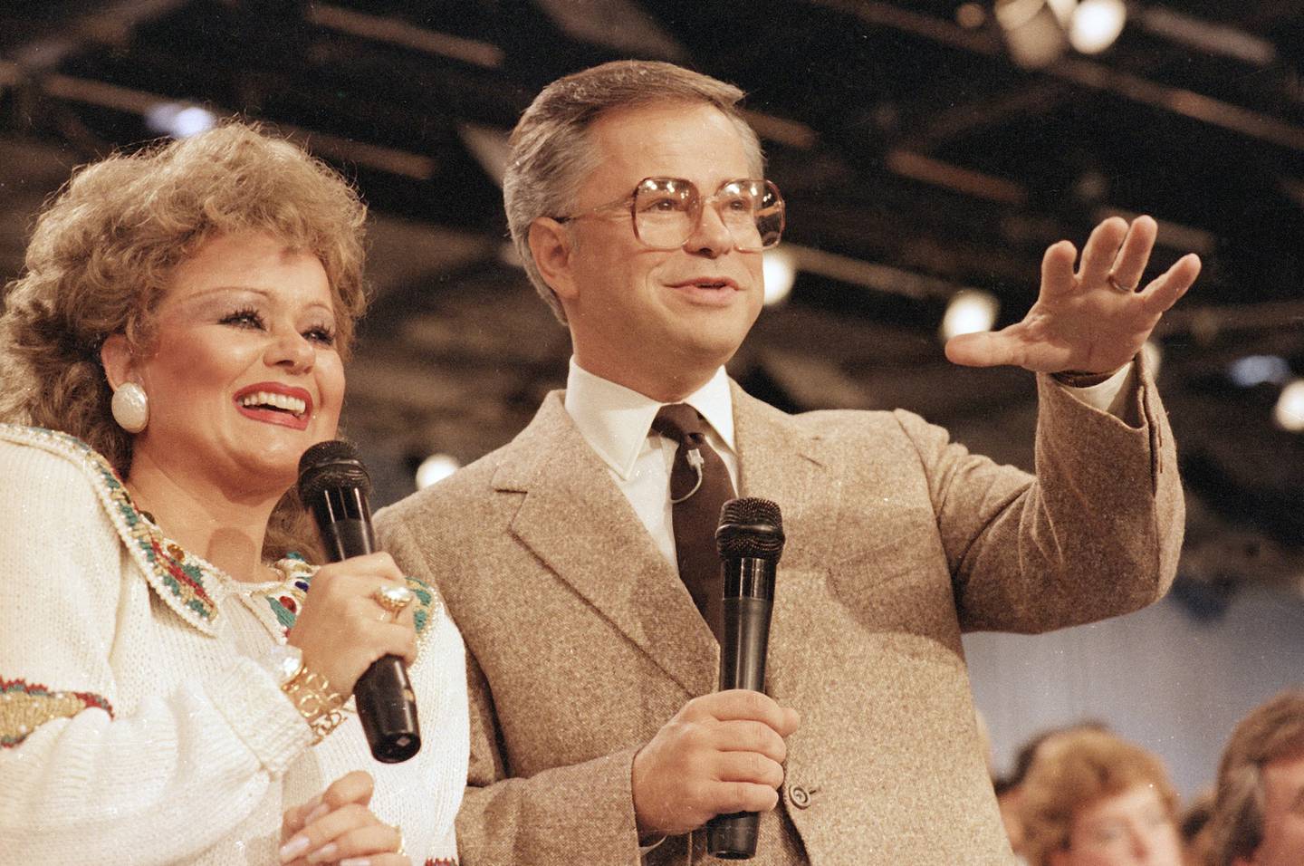 Jim And Tammy Faye Bakker are shown talking to their television audience, Aug. 20, 1986 at their PTL Ministry in Fort Mill, S.C.  (AP Photo/Lou Krasky)