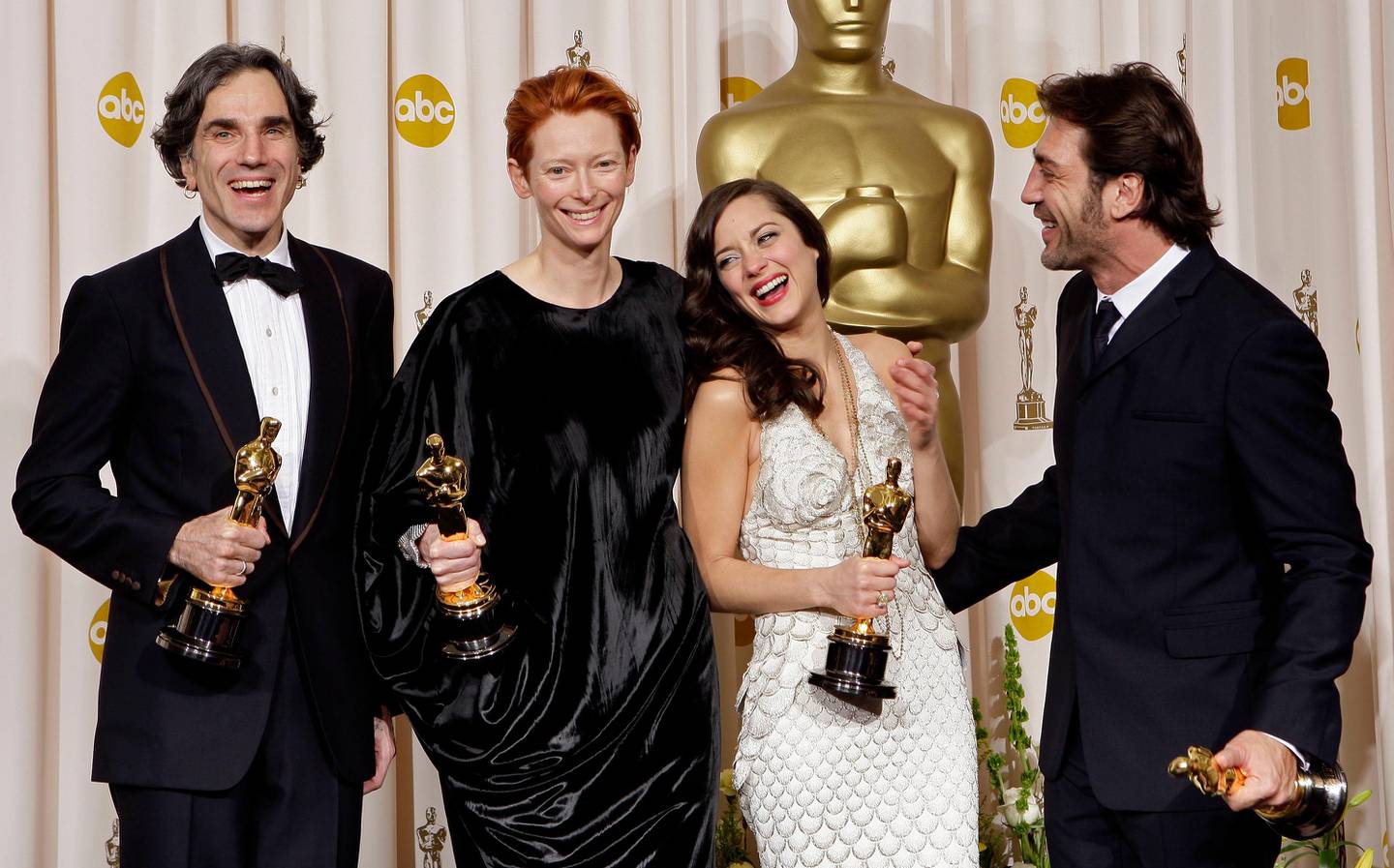 From left, British actor Daniel Day-Lewis poses with the Oscar for best actor for his work in "There Will Be Blood," British actress Tilda Swinton poses with the Oscar for best supporting actress for her work in "Michael Clayton," French actress Marion Cotillard poses with the Oscar for best actress for her work in "La Vie en Rose," and Spanish actor Javier Bardem poses with the Oscar for best supporting actor for his work in "No Country for Old Men" at the 80th Academy Awards Sunday, Feb. 24, 2008, in Los Angeles.(AP Photo/Kevork Djansezian) 