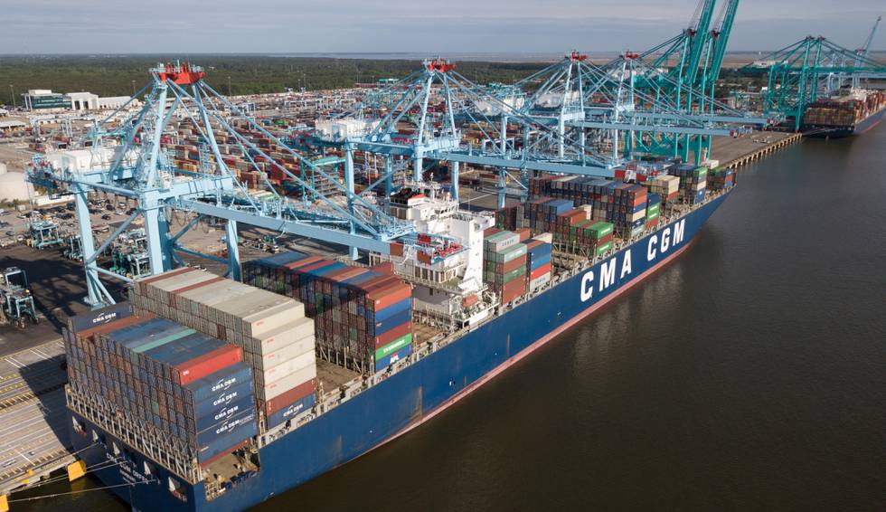 A container ship is unloaded at the Virginia International Gateway terminal in Norfolk, Va., Friday, May 10, 2019. President Donald Trump's latest tariff hike on Chinese goods took effect Friday and Beijing said it would retaliate, escalating a battle over China's technology ambitions and other trade tensions. (AP Photo/Steve Helber)