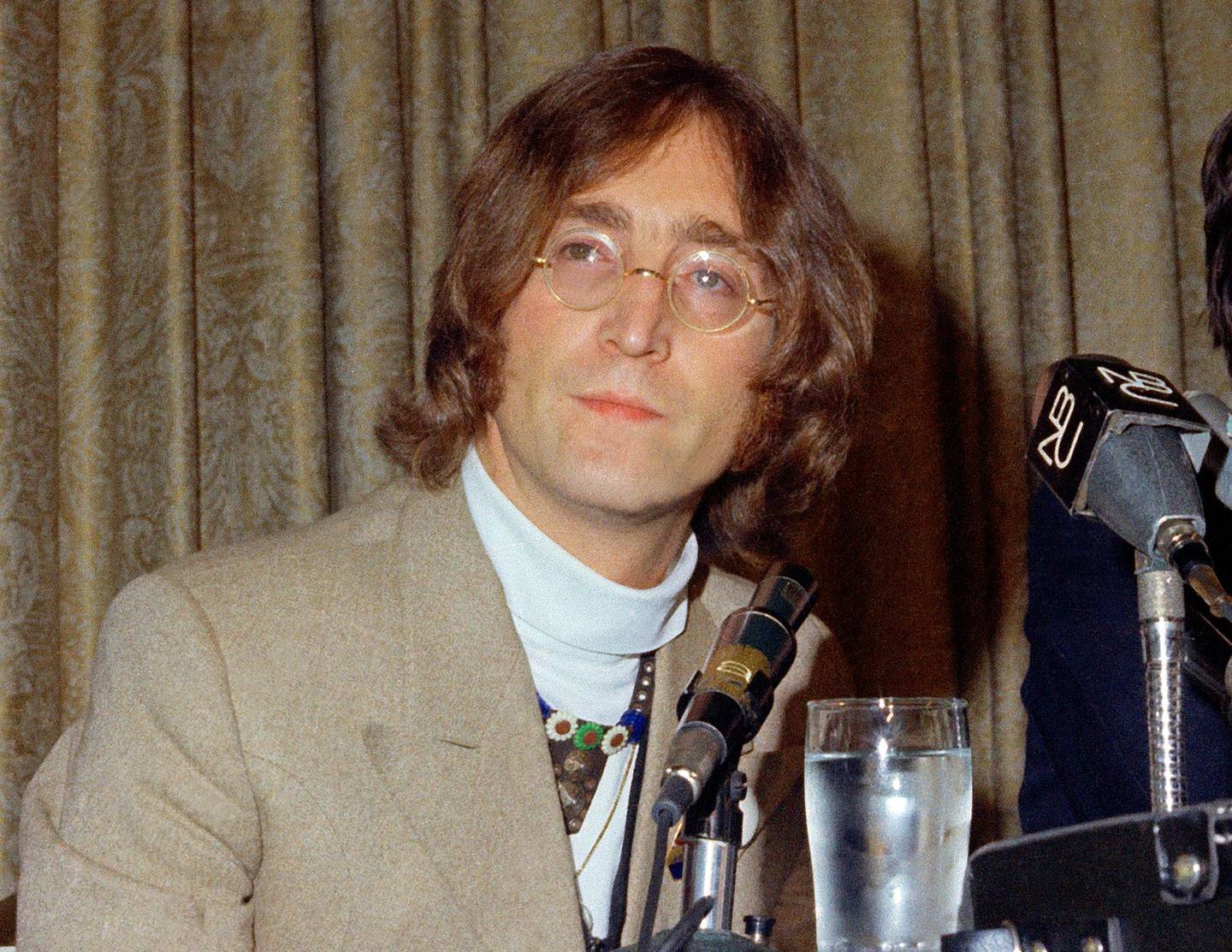 FILE - In this 1971 file photo, singer John Lennon appears during a press conference. Mark David Chapman, 63, who shot and killed Lennon on Dec. 8, 1980, was denied parole for a tenth time on Thursday, Aug. 23, 2018 by New York's Parole Board. He will be up for parole again in August 2020. (AP Photo, File)