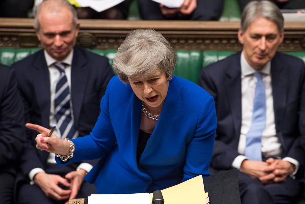 Britain's Prime Minister Theresa May speaks during a debate before a no-confidence vote on Theresa May raised by opposition Labour Party leader Jeremy Corbyn, in the House of Commons, London, Wednesday Jan. 16, 2019.  In a historic defeat for the government Tuesday, Britain's Parliament discarded May's Brexit deal to split from the European Union, and May now faces a parliamentary vote of no-confidence Wednesday. (Mark Duffy, UK Parliament via AP)