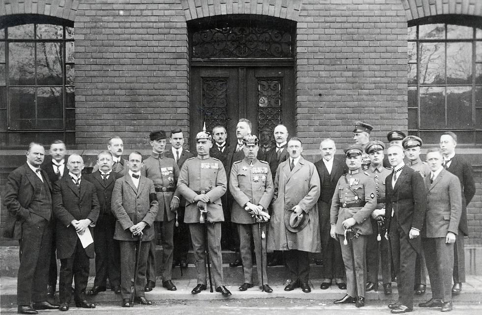 HITLER: MUNICH TRIAL, 1924. Nazi leader Adolf Hitler and other Nazis at the trial following the Beer Hall Putsch at Munich, Germany. From left (in uniform): Friedrich Weber, Hermann Kriebel, Erich Ludendorff, Hitler, Wilhelm Brueckner, Ernst Roehm, Heinz Pernet, Wilhelm Frick (in civilian clothes), and Robert Wagner. Photographed 26 February 1924. , Category: WAR, POLITICS
