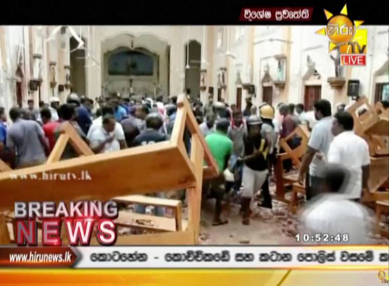 ADDS DETAIL OF THE PLACE - This image made from video provided by Hiru TV shows damage inside St. Anthony's Shrine after a blast in Colombo, Sunday, April 21, 2019. Near simultaneous blasts rocked three churches and three hotels in Sri Lanka on Easter Sunday. (Hiru TV via AP)