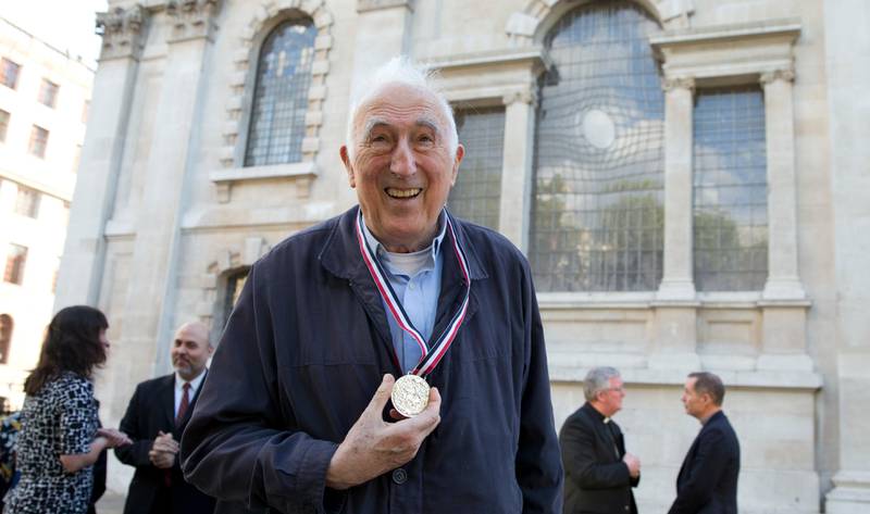 FILE - In this May 18, 2018 file photo, Canadian Jean Vanier founder of L'Arche communities poses for a photograph after he received the Templeton Prize at St Martins-in-the-Fields church in London. Vanier, a Canadian religious figure whose charity work helped improve conditions for the developmentally disabled in multiple countries over the past half-century, has died Tuesday May 7, 2019 in Paris after suffering from thyroid cancer at 90. (AP Photo/Alastair Grant, File)