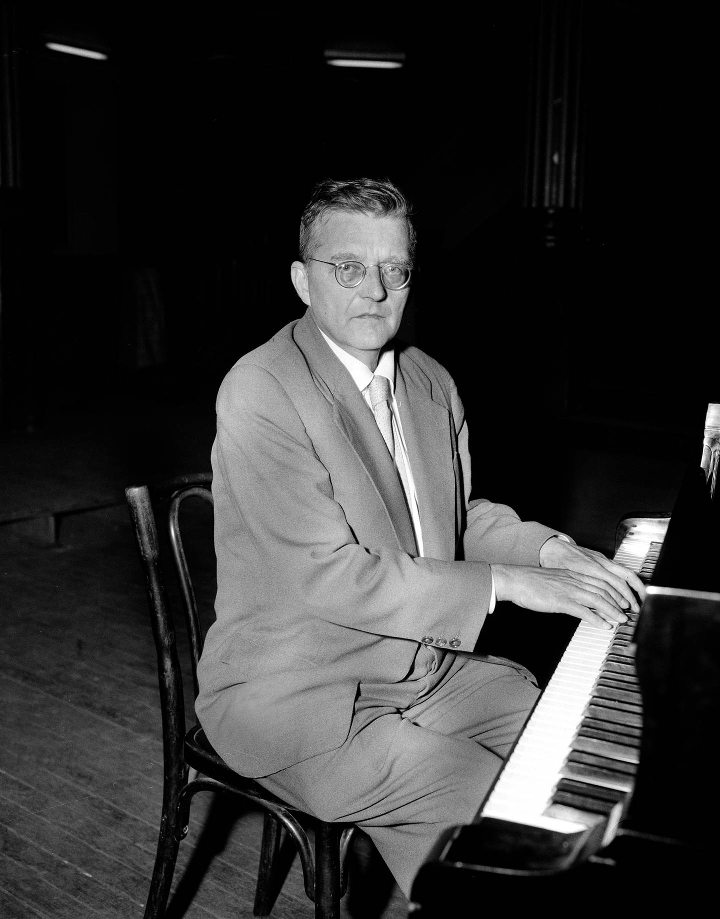 Soviet composer Dmitry Shostakovich poses during a recording session for the French record label Pathe Marconi, Paris, May 23, 1958. Shostakovich is scheduled to perform two of his own piano concertos on May 27-28 at the Palais de Chaillot. (AP Photo)