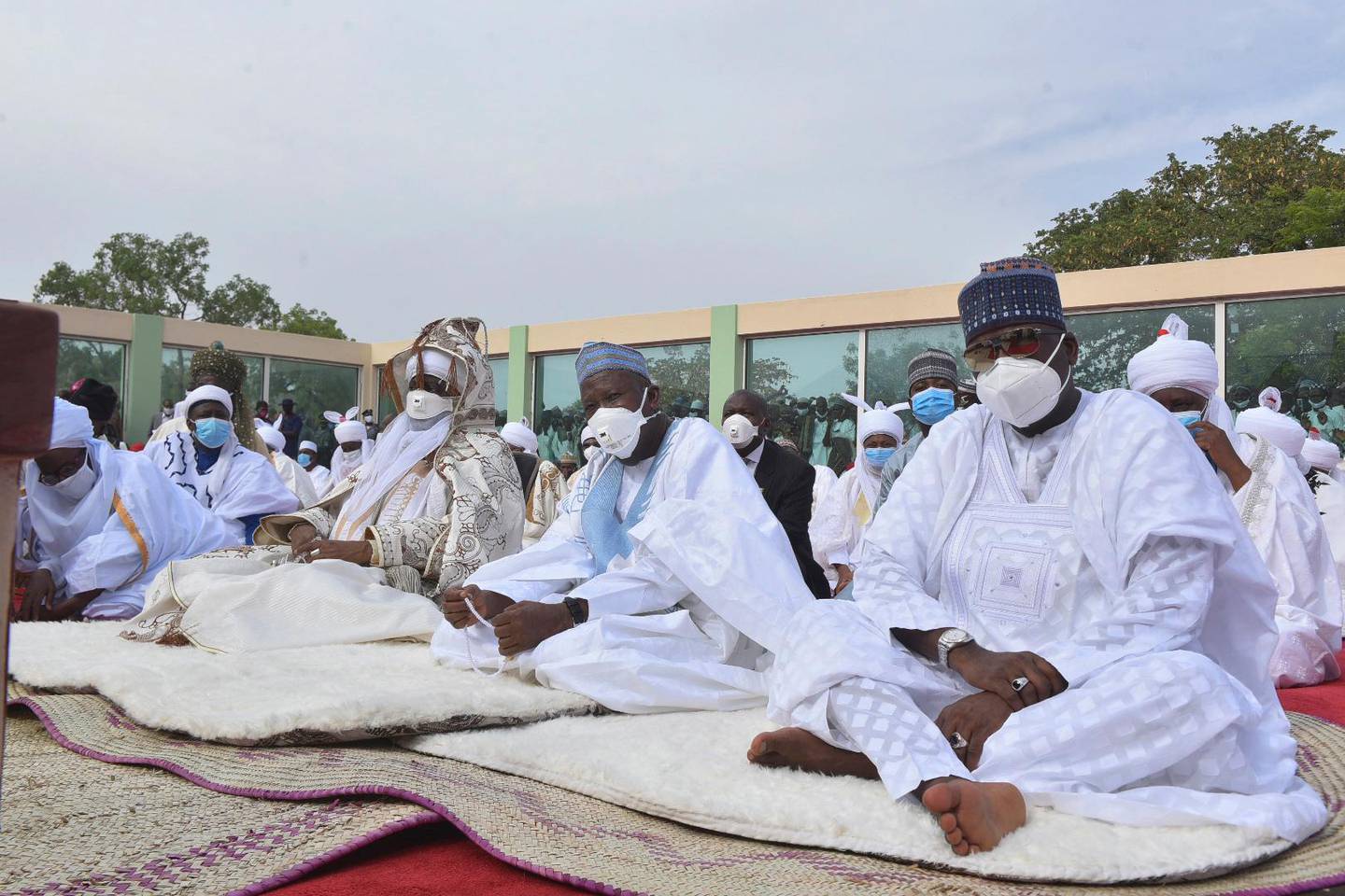 Nigeria Muslims wearing face masks to protect against coronavirus, attend Eid prayers at the Kofar Mata prayer ground in Kano Nigeria, Sunday, May 24, 2020. The holiday of Eid al-Fitr, the end of the fasting month of Ramadan, a usually joyous three-day celebration has been significantly toned down as coronavirus cases soar. (AP Photo)