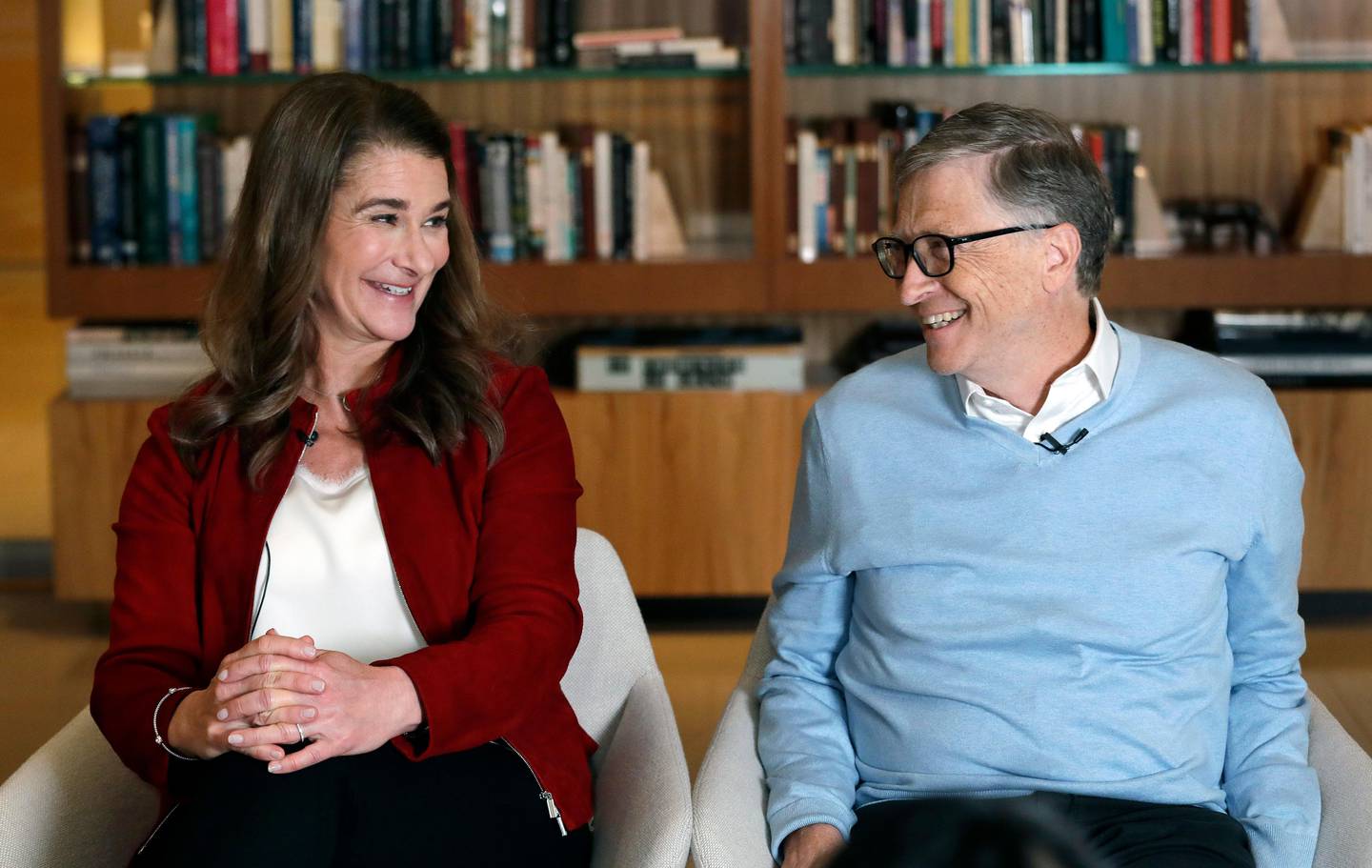 In this Feb. 1, 2019, Bill and Melinda Gates look toward each other and smile while being interviewed in Kirkland, Wash. The couple, whose foundation has the largest endowment in the world, are pushing back against a new wave of criticism about whether billionaire philanthropy is a force for good. They said they?Äôre not fazed by recent blowback against wealthy giving, including viral moments at the World Economic Forum and the shifting political conversation about taxes and socialism. (AP Photo/Elaine Thompson)