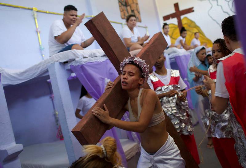 Female inmates perform Bible stories during Nelson Hungria Prison's annual Christmas event before fellow inmates and jail staff in Rio de Janeiro, Brazil, Thursday, Dec. 13, 2018. Inmates serving time for offenses from burglary to homicide spent weeks decking out their cell blocks with handmade decorations and planning Christmas related performances. (AP Photo/Silvia Izquierdo)