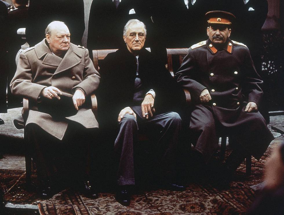 FILE - This is a Feb. 4, 1945, file photo of from left, British Prime Minister Winston Churchill, U.S. President Franklin Roosevelt and Soviet Premier Josef Stalin as they sit on the patio of Livadia Palace, Yalta, Crimea.  Initially hailed as a major success, the conference later came to be viewed by some as the moment that the U.S. ceded too much influence to the Soviets and the trigger for the Cold War. 
 (AP Photo/File)
