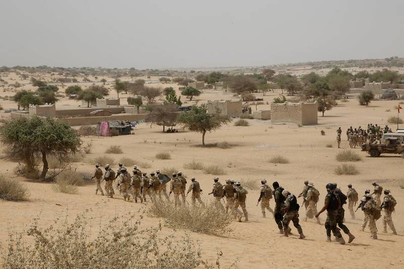 FILE- In this March 7, 2015, file photo, Chadian troops and Nigerian special forces participate in the Flintlock exercises with the U.S. military and its Western partners in Mao, Chad. The Pentagon told The Associated Press on Oct. 27, 2017, that there is no truth to claims in a viral story that Sgt. La David Johnson betrayed his fellow soldiers in an ambush that killed him and three of his comrades in Niger earlier this month. (AP Photo/Jerome Delay, File)