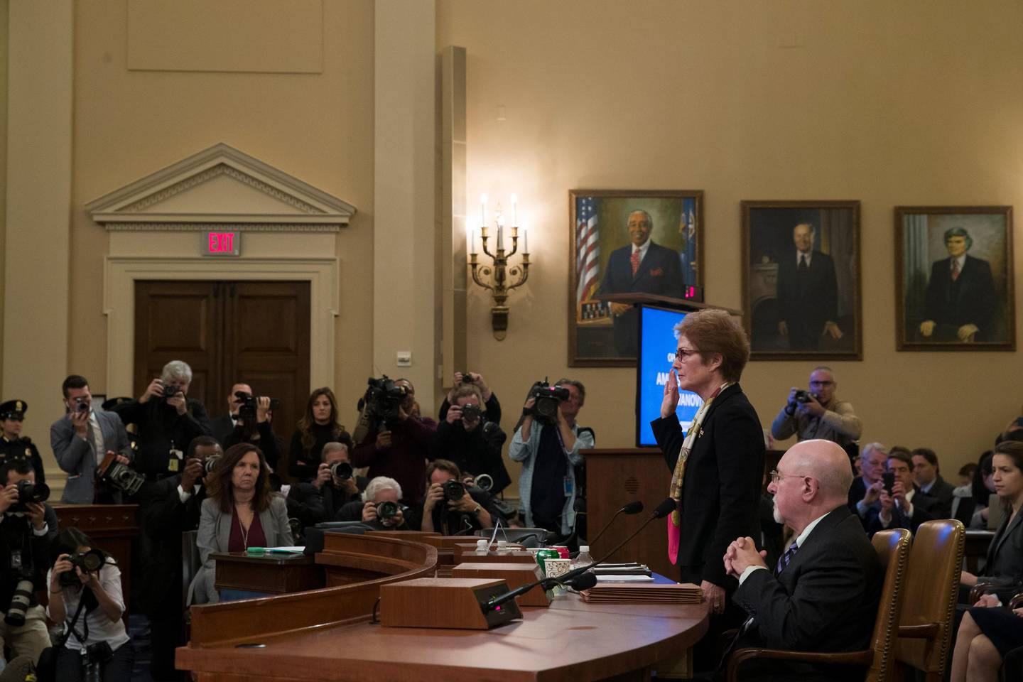 Former U.S. Ambassador to Ukraine Marie Yovanovitch is sworn in to testify before the House Intelligence Committee on Capitol Hill in Washington, Friday, Nov. 15, 2019, during the second public impeachment hearing of President Donald Trump's efforts to tie U.S. aid for Ukraine to investigations of his political opponents. (AP Photo/Alex Brandon)