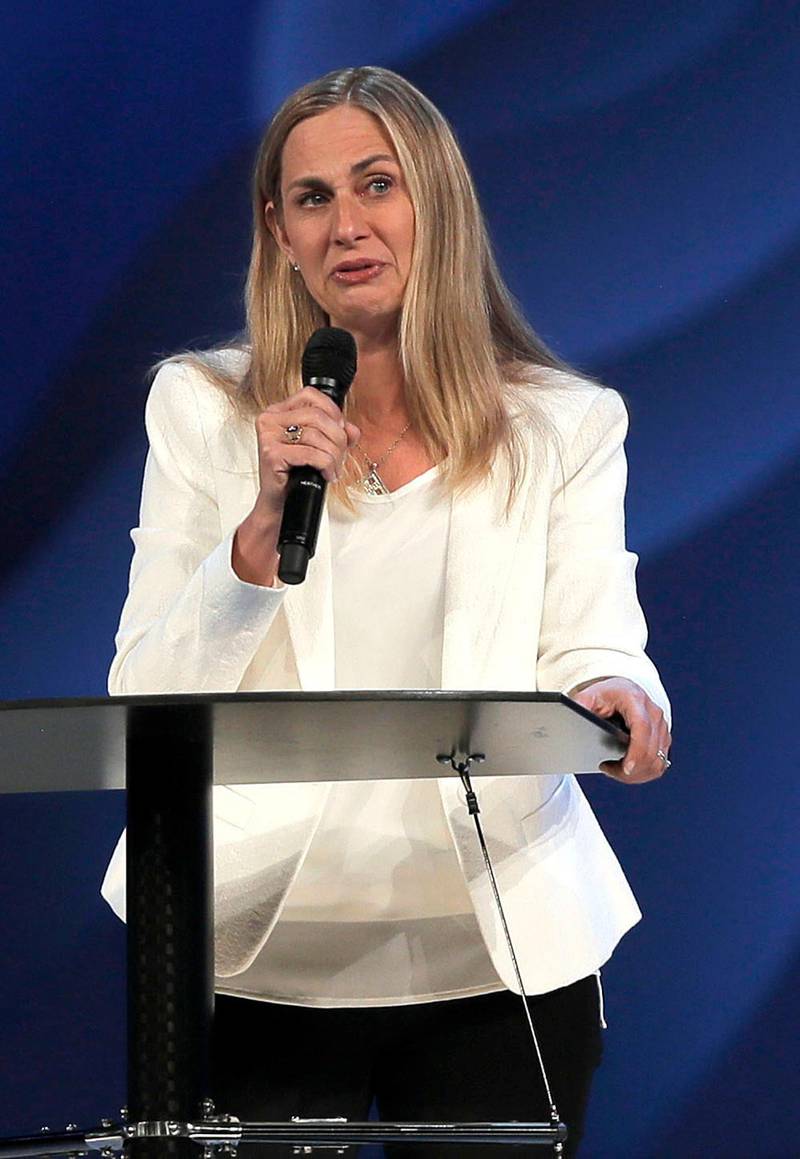 Willow Creek Community Church lead pastor Heather Larson speaks at the church, Wednesday, Aug. 8, 2018, in South Barrington, Ill. Larson said she is stepping down, and the entire Board of Elders will do so by the end of the year. Larson said the church needed new leadership in the wake of sexual harassment allegations against church founder Bill Hybels. (Steve Lundy/Daily Herald via AP)