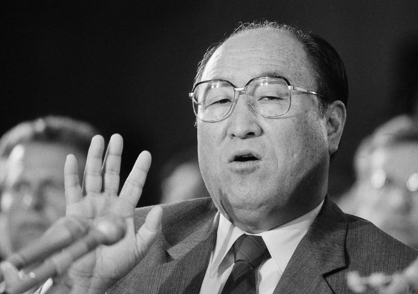 Rev. Sun Myung Moon, of the Unification Church make a statement, June 26, 1984 at Capitol Hill in Washington as he appeared before the Senate Judiciary Committee holding hearings on religious freedom. Moon is under sentence to jail for tax evasion. (AP Photo/Lana Harris)