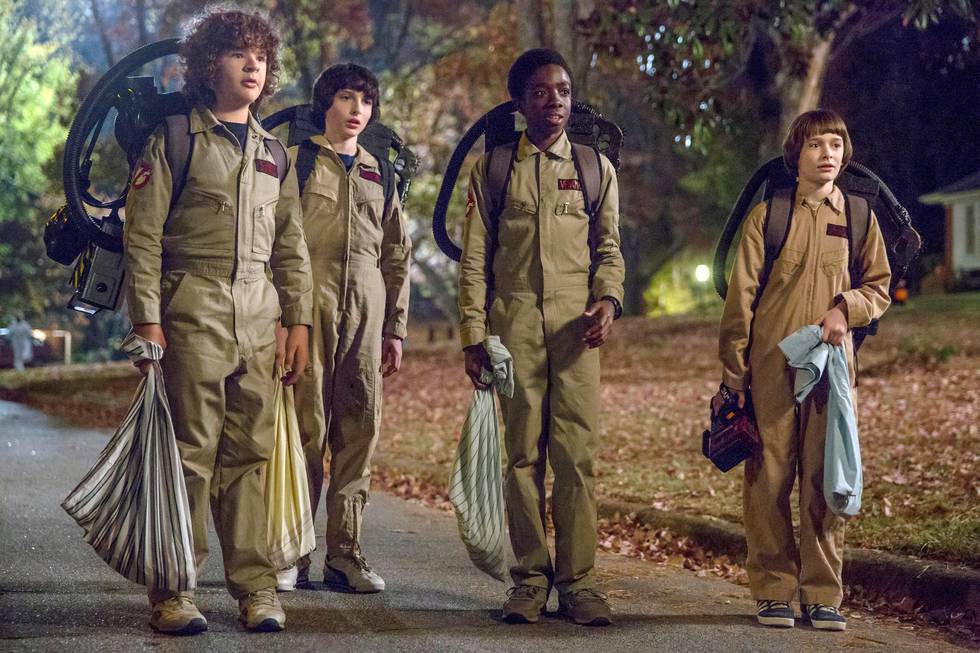 This image released by Netflix shows Gaten Matarazzo, from left, Finn Wolfhard, Caleb McLaughlin and Noah Schnapp in a scene from "Stranger Things," premiering its second season on Friday. (Netflix via AP)