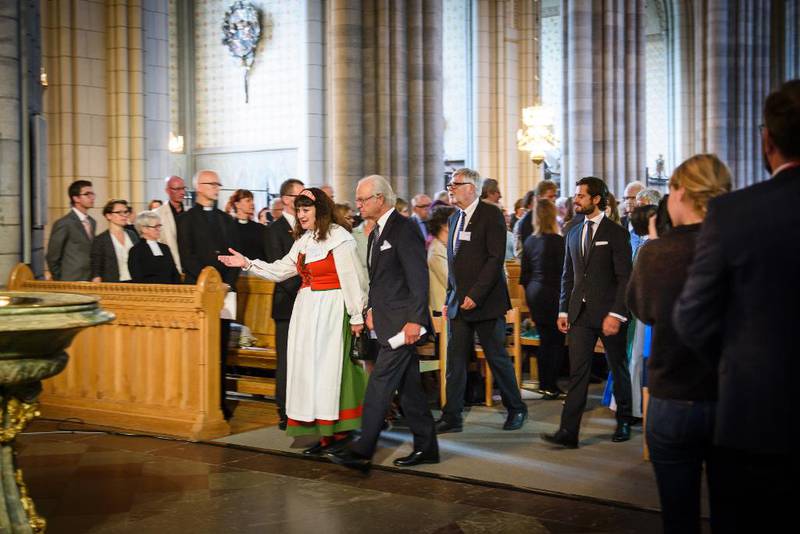 Kirkemøtets ordfører, Karin Perers sammen med kong Carl Gustaf og prins Carl Philip ved Kirkemøtets åpningsgudstjeneste i Uppsala domkirke.