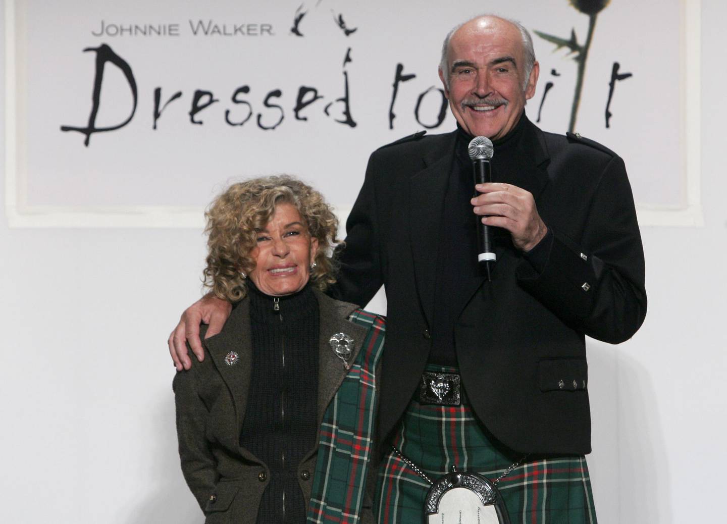Sir Sean Connery and his wife Micheline attend the "Dressed to Kilt" fashion show, Monday, April 3, 2006, in New York, which benefits Friends of Scotland, a charity dedicated to advancing contemporary Scottish issues in the United States.  The fashion show highlights top designers from Scotland and modern kilt designs.  (AP Photo/Diane Bondareff)