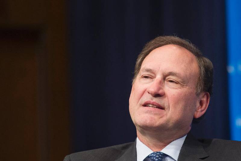 Supreme Court Justice Samuel Alito gestures while speaking at Georgetown University Law Center's third annual Dean's Lecture to the Graduation Class,  in Washington, Tuesday, Feb. 23, 2016. (AP Photo/Cliff Owen)