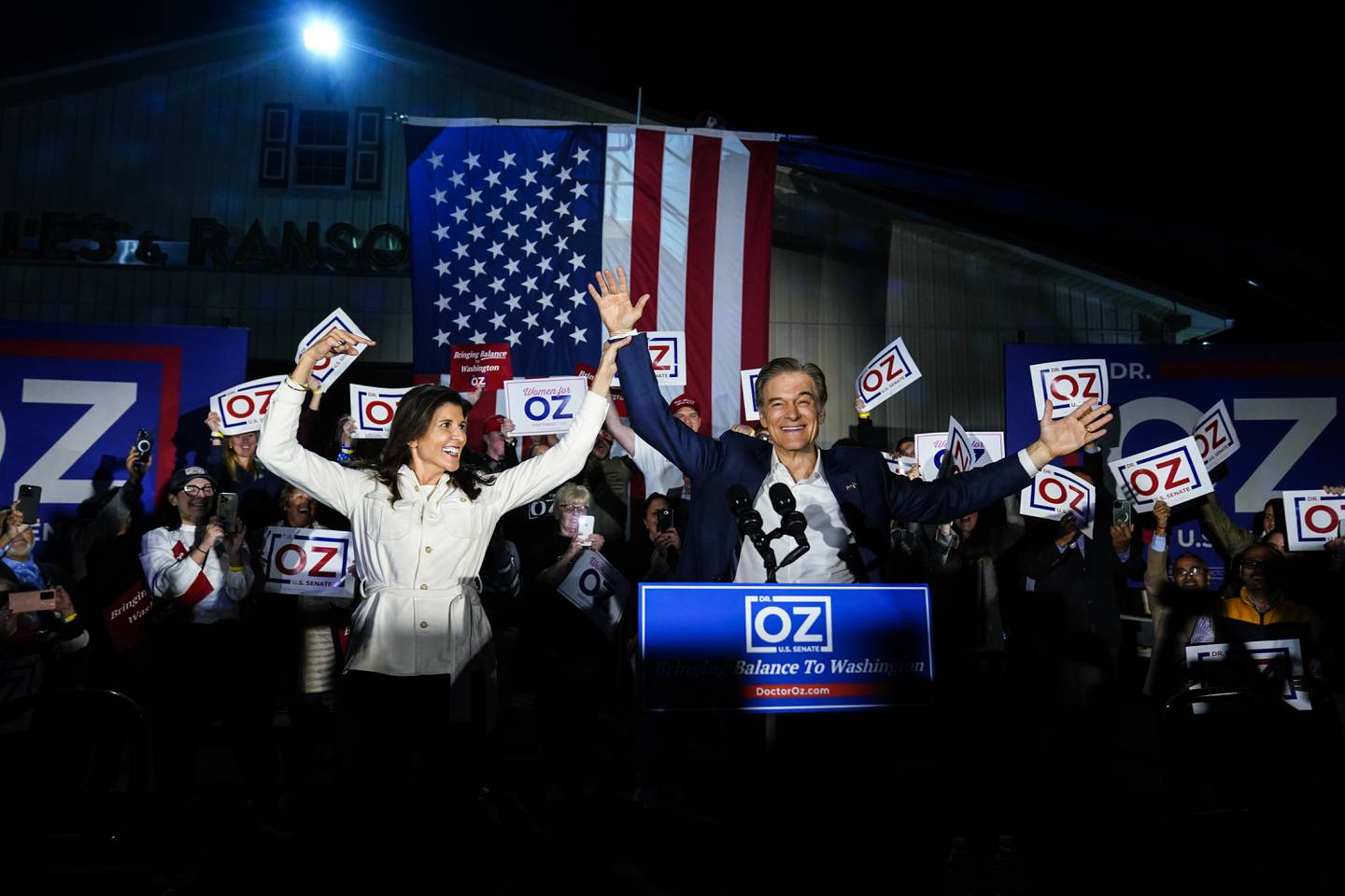 Mehmet Oz, a Republican candidate for U.S. Senate in Pennsylvania, is joined by former U.N. Ambassador Nikki Haley during campaign rally in Pennsburg, Pa., Monday, Nov. 7, 2022. (AP Photo/Matt Rourke)