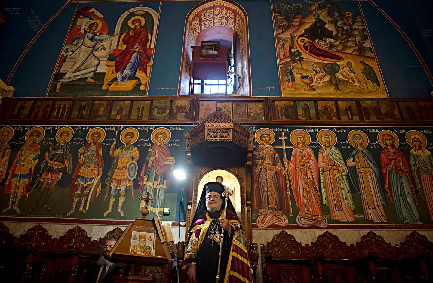 Greek Orthodox Archbishop Alexios leads Christmas Eve Mass at St. Porphyrios Church in Gaza City, Tuesday, Jan. 7, 2020. (AP Photo/Khalil Hamra)