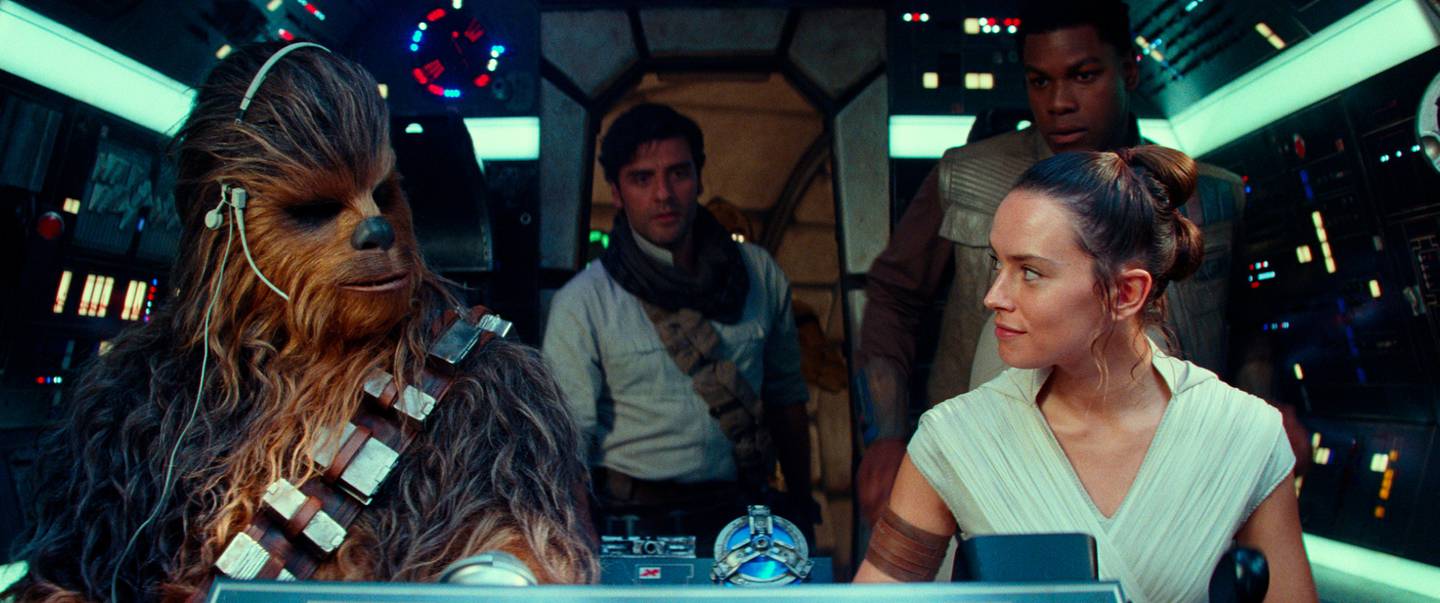 This image released by Disney/Lucasfilm shows, from left,  Joonas Suotamo as Chewbacca, Oscar Isaac as Poe Dameron, Daisy Ridley as Rey and John Boyega as Finn in a scene from "Star Wars: The Rise of Skywalker." (Disney/Lucasfilm Ltd. via AP)
