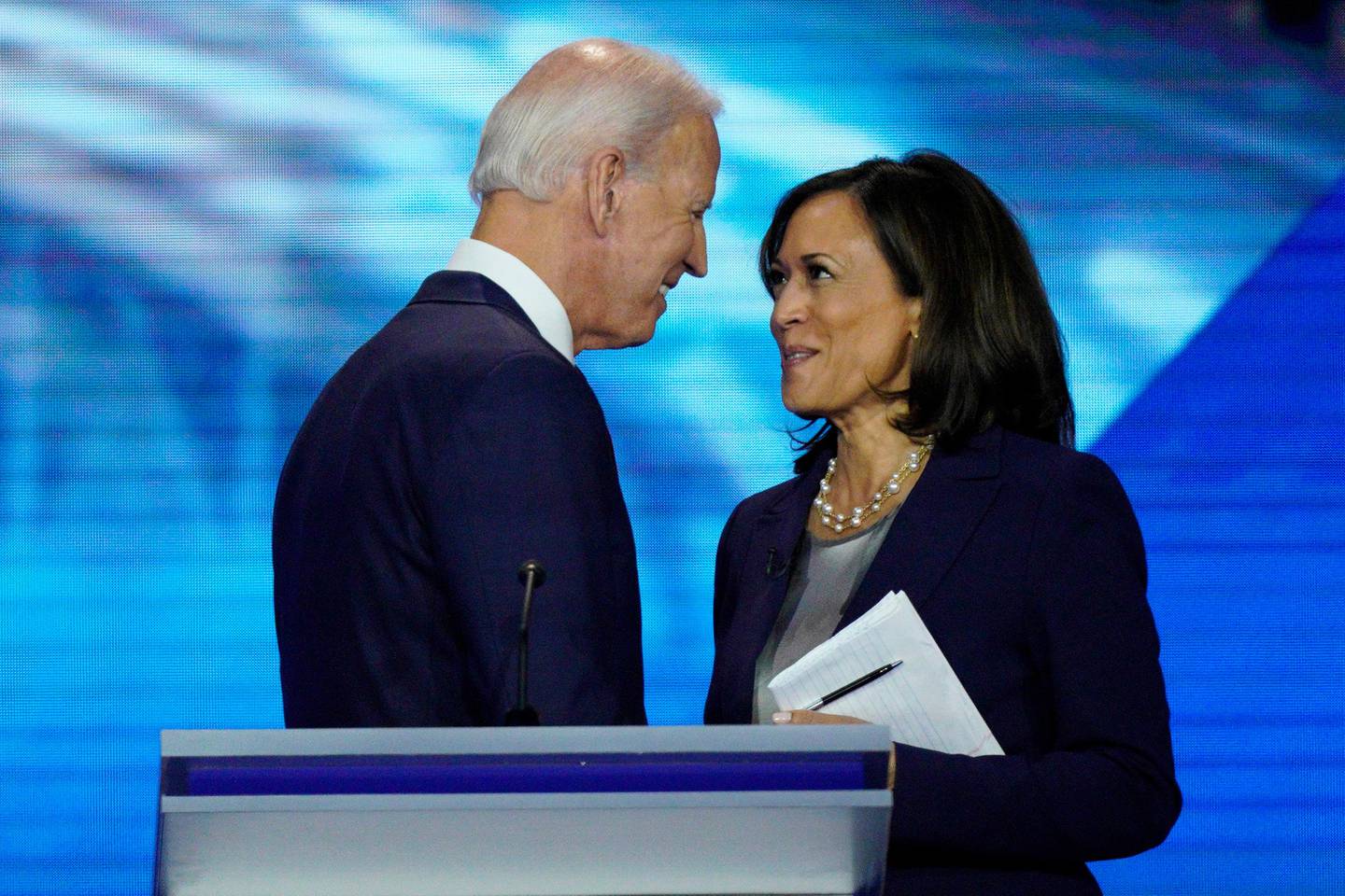 FILE - In this Sept. 12, 2019, file photo, Democratic presidential candidate former Vice President Joe Biden, left, and then-candidate Sen. Kamala Harris, D-Calif. shake hands after a Democratic presidential primary debate hosted by ABC at Texas Southern University in Houston. Biden has chosen Harris as his running mate. (AP Photo/David J. Phillip, File)