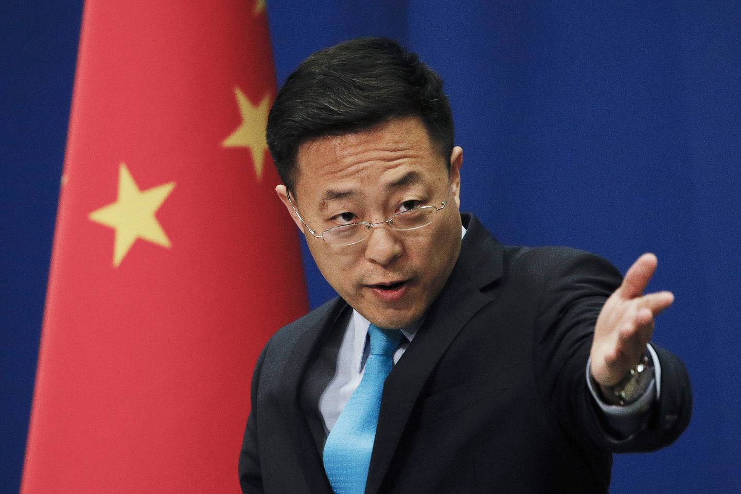 Talsmann for Kinas utenriksdepartement Zhao Lijian ber USA spille en mer konstruktiv rolle. Arkivfoto: Andy Wong / AP / NTB