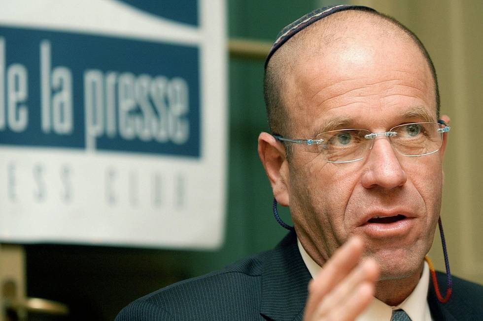 Israeli Avraham Burg, member of the Knesset, speaks during a press conference in Geneva, Switzerland, Wednesday, Dec. 1, 2004, on the occasion of the 1st anniversary of the Geneva peace initiative between Israelis and Palestinians. (AP Photo/Keystone, Sandro Campardo)
