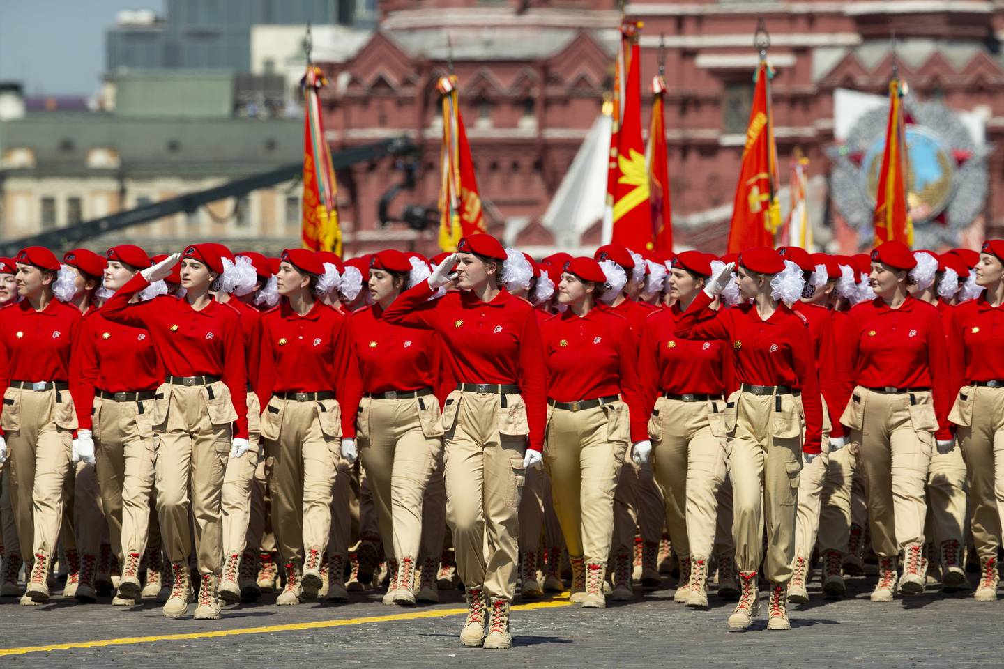 Members of Yunarmia (Young Army), an organization sponsored by the Russian military that aims to encourage patriotism among the Russian youth march in Red Square during the Victory Day military parade marking the 75th anniversary of the Nazi defeat in WWII in Moscow, Russia, Wednesday, June 24, 2020. The Victory Day parade normally is held on May 9, the nation's most important secular holiday, but this year it was postponed due to the coronavirus pandemic. (AP Photo/Alexander Zemlianichenko)