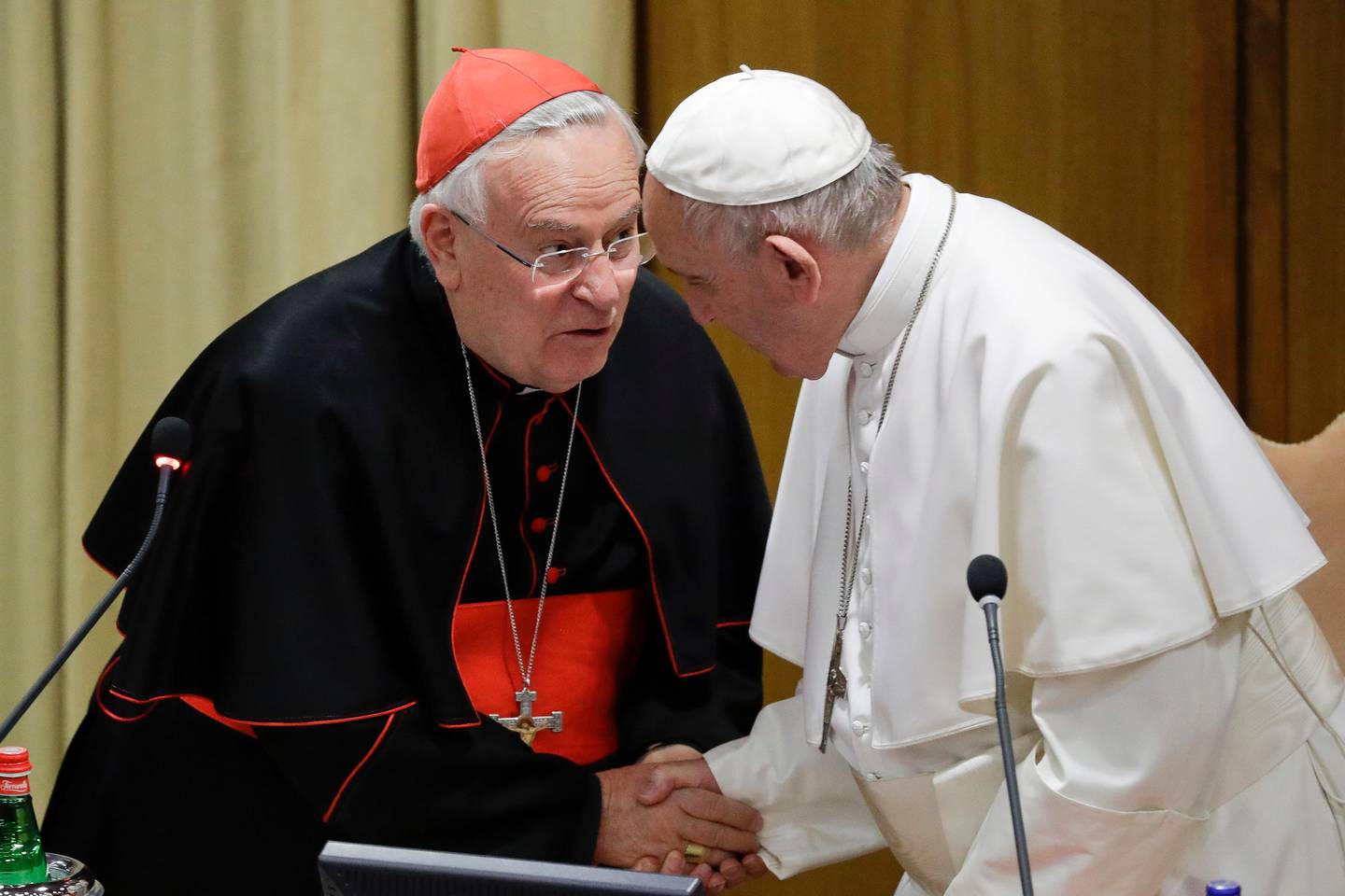 Pope Francis talks with Cardinal Gualtiero Bassetti, president of the Italian Bishops Conference, during their annual meeting, at the Vatican, Monday, May 20, 2019. (AP Photo/Andrew Medichini)
