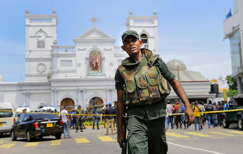 In this Sunday, April 21, 2019, Sri Lankan Army soldiers secure the area around St. Anthony's Shrine after a blast in Colombo, Sri Lanka. Sri Lankan authorities blame seven suicide bombers of a domestic militant group for coordinated Easter bombings that ripped through Sri Lankan churches and luxury hotels which killed and injured hundreds of people. It was Sri Lanka's deadliest violence since a devastating civil war in the South Asian island nation ended a decade ago. (AP Photo/Eranga Jayawardena, file)