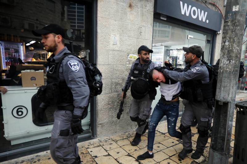 Israeli police arrests a Palestinian during a protest demanding a release of Heba al-Labadi, a Jordanian citizen of Palestinian descent, in east Jerusalem, Saturday, Oct. 26, 2019. Labadi was arrested Aug. 20, 2019, at the Allenby Bridge crossing between Jordan and the Israeli-occupied West Bank and has been on a hunger strike since Sept. 26. (AP Photo/Mahmoud Illean)