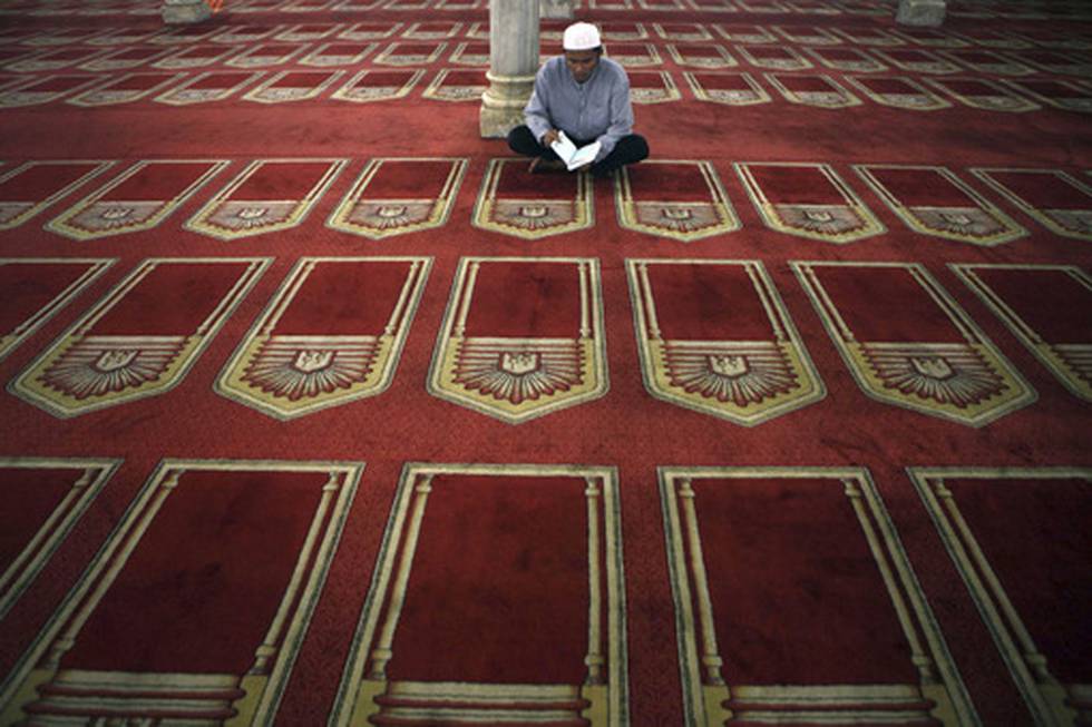 Lesing av Koranen i Al Azhar-moskeen i Kairo.