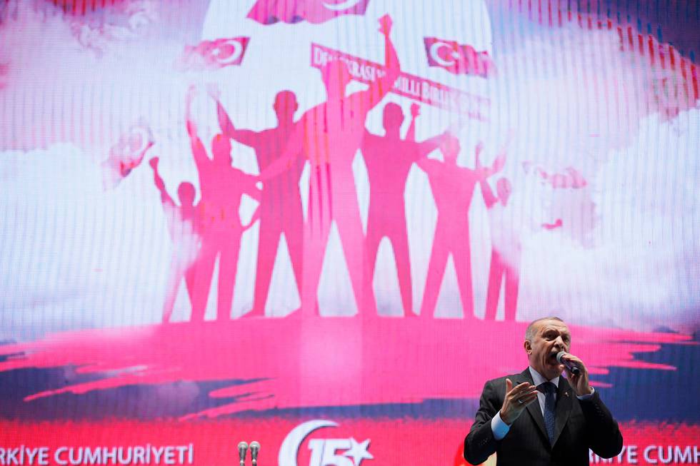 Turkey's President Recep Tayyip Erdogan delivers a speech during a commemoration event for the second anniversary of a botched coup attempt, in Istanbul, Sunday, July 15, 2018. With prayers and other events, Turkey on Sunday commemorated the second anniversary of thwarting a coup against the Turkish president and the government that left nearly 290 people dead and hundreds wounded. (AP Photo/Emrah Gurel)