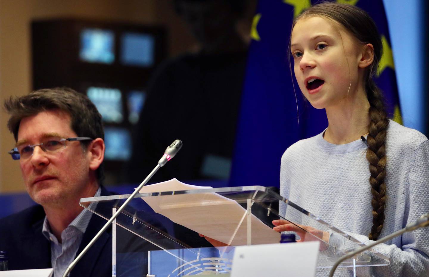 Swedish climate activist Greta Thunberg addresses a meeting of the Environment Council at the European Parliament in Brussels, Wednesday, March 4, 2020. Climate activists and Green members of the European Parliament are urging the European Union to be more ambitious as the bloc gets ready to unveil plans for a climate law to cut greenhouse gas emissions to zero by mid-century. (AP Photo/Olivier Matthys)