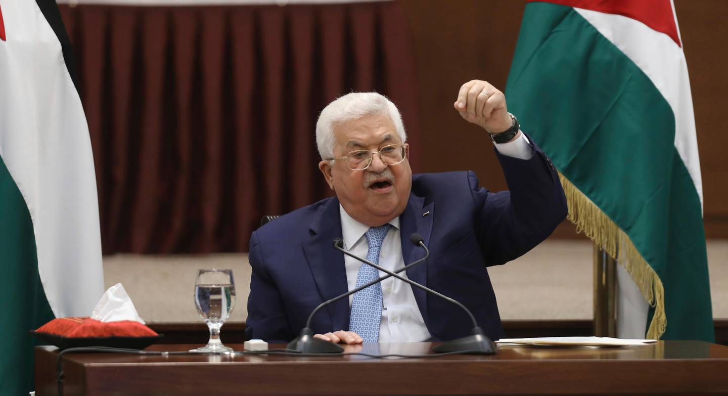Palestinian President Mahmoud Abbas heads a leadership meeting at his headquarters, in the West Bank city of Ramallah, Tuesday, May 19, 2020. (Alaa Badarneh/Pool Photo via AP)