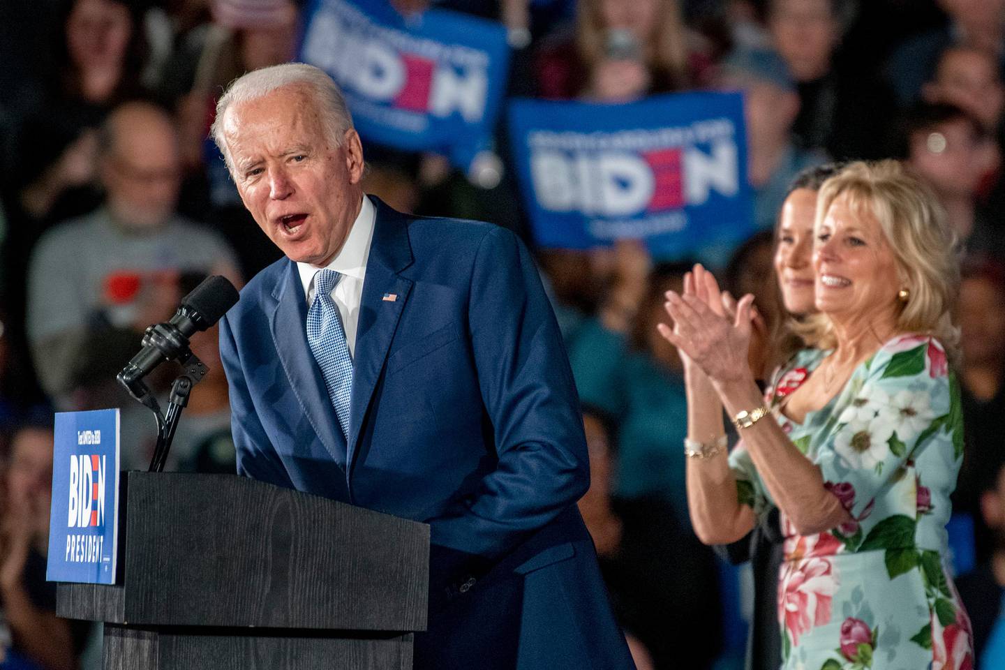 Democratic presidential candidate and former Vice President Joe Biden speaks as his wife Jill Biden, far right, and daughter Ashley stand by during his primary election night rally in Columbia, S.C., Saturday, Feb. 29, 2020, after winning the South Carolina primary. (Tom Gralish/The Philadelphia Inquirer via AP)