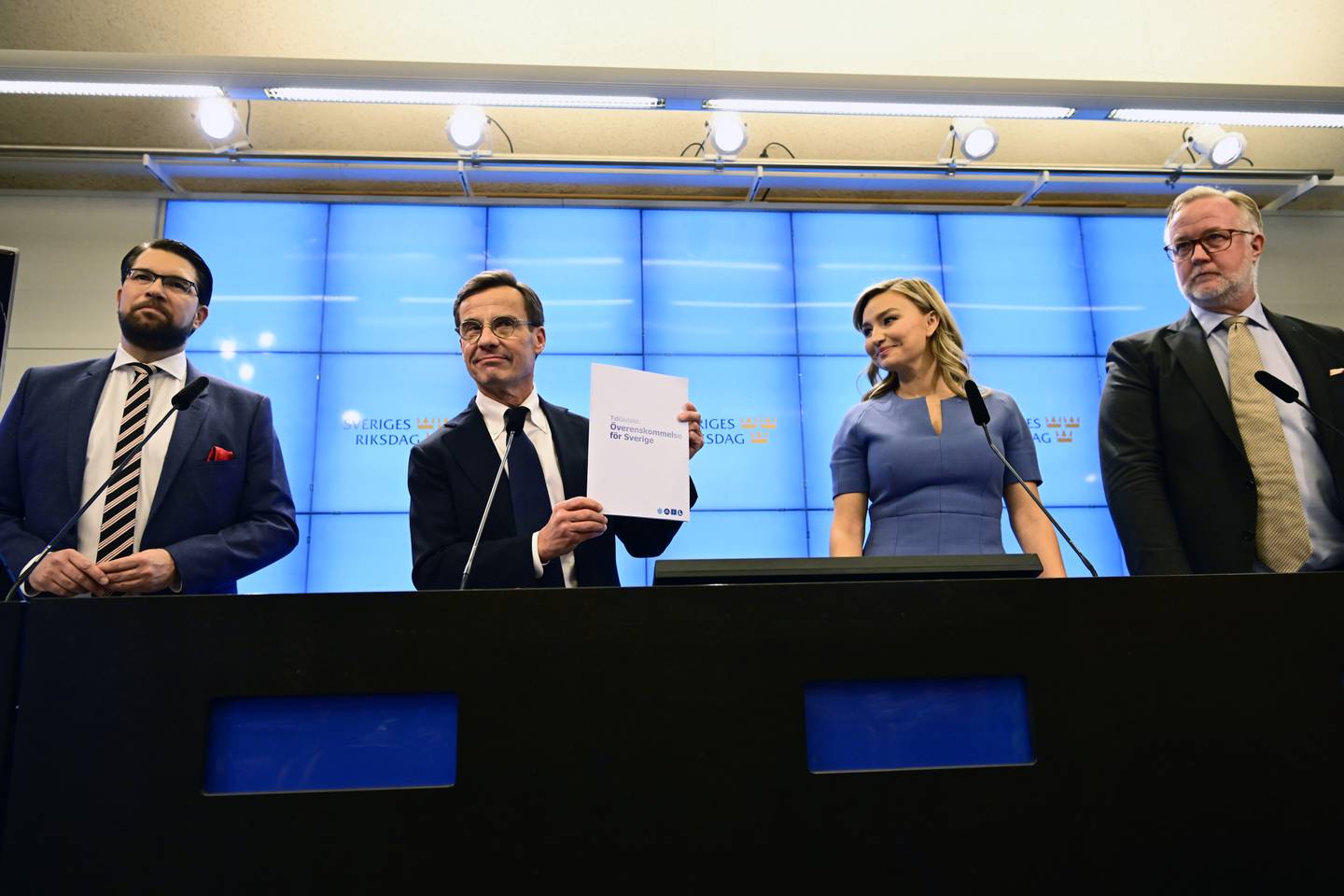 From left: Jimmie Åkesson, leader of the Sweden Democrats Party, Ulf Kristersson, leader of the Moderate Party, Ebba Busch, leader of the Christian Democrats, and Johan Pehrson, leader of the Liberal Party, attend a press conference regarding the formation of the government, at the Parliament in Stockholm, Sweden, Friday Oct. 14, 2022. (Jonas Ekströmer/TT News Agency via AP)