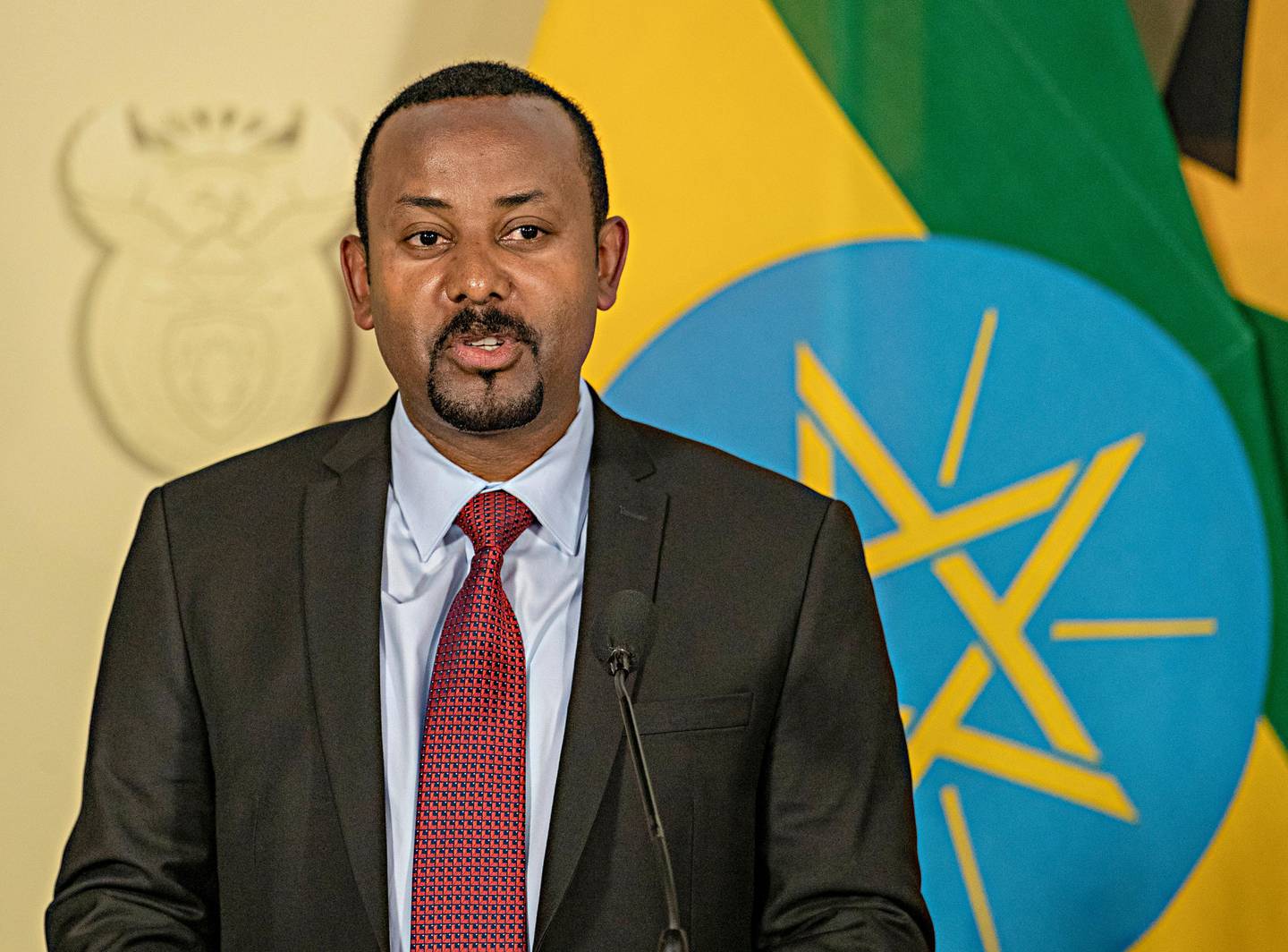 Ethiopia's Prime Minister Abiy Ahmed speaks during a joint media conference with South African President Cyril Ramaphosa after their talks at the Union Building in Pretoria, South Africa, Sunday, Jan. 12, 2020. (AP Photo/Themba Hadebe)