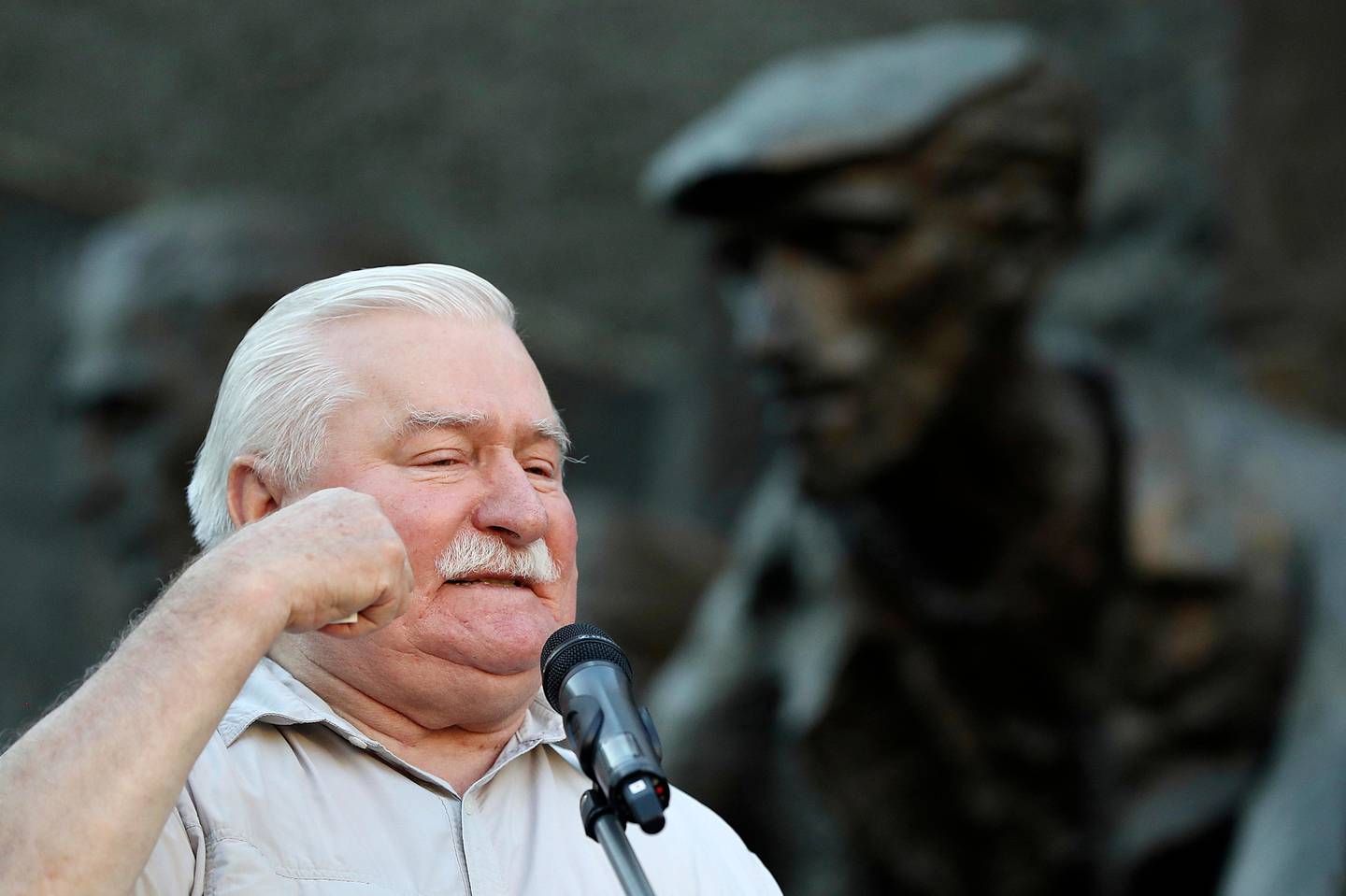 Polish pro-democracy campaigner and Nobel Peace Prize winner Lech Walesa addresses a crowd of right-wing government opponents in Warsaw, Poland, Wednesday, July 4, 2018. Poland?Äôs international isolation and political uncertainty at home has deepened as a purge of the Supreme Court?Äôs justices took effect, with the chief justice defiantly refusing to step down. First President Malgorzata Gersdorf arrived for work as usual at the court in Warsaw, vowing to continue her constitutionally mandated term, which runs through 2020. (AP Photo/Czarek Sokolowski)