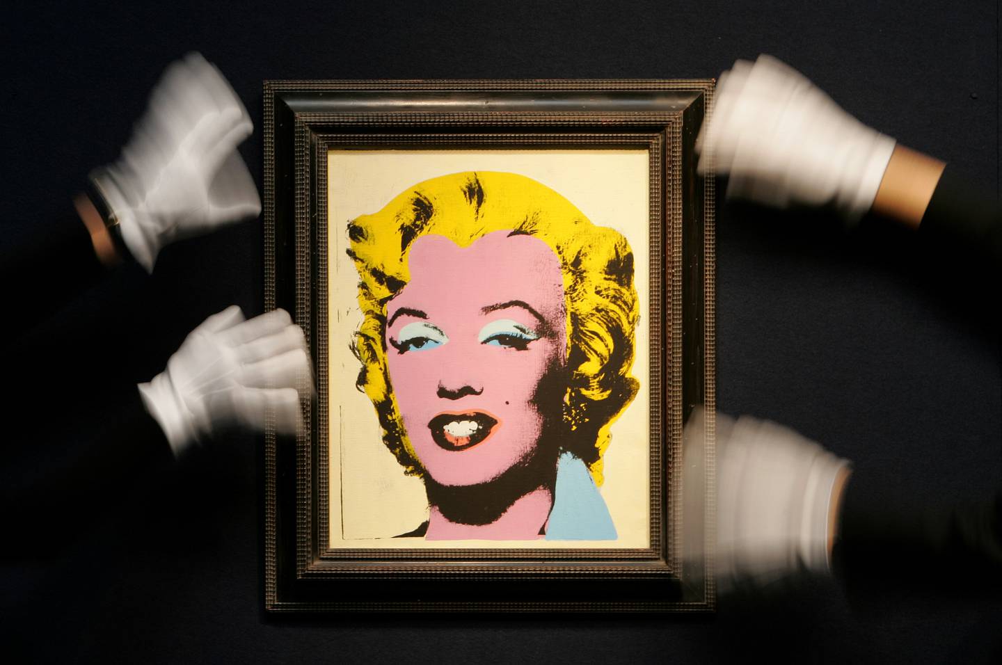 An Andy Warhol portrait of Marilyn Monroe called  'Lemon Marilyn', 1962 is hung at Christie's auction rooms in London, Monday March 19 , 2007. The portrait which was purchased by a US collector for $250 in 1962 and remained in the same ownership for nearly 45-years, is being auctioned at Christie's New York on May 16, 2007 and is expected to realize in excess of $15 million. (AP Photo/Kirsty Wigglesworth)