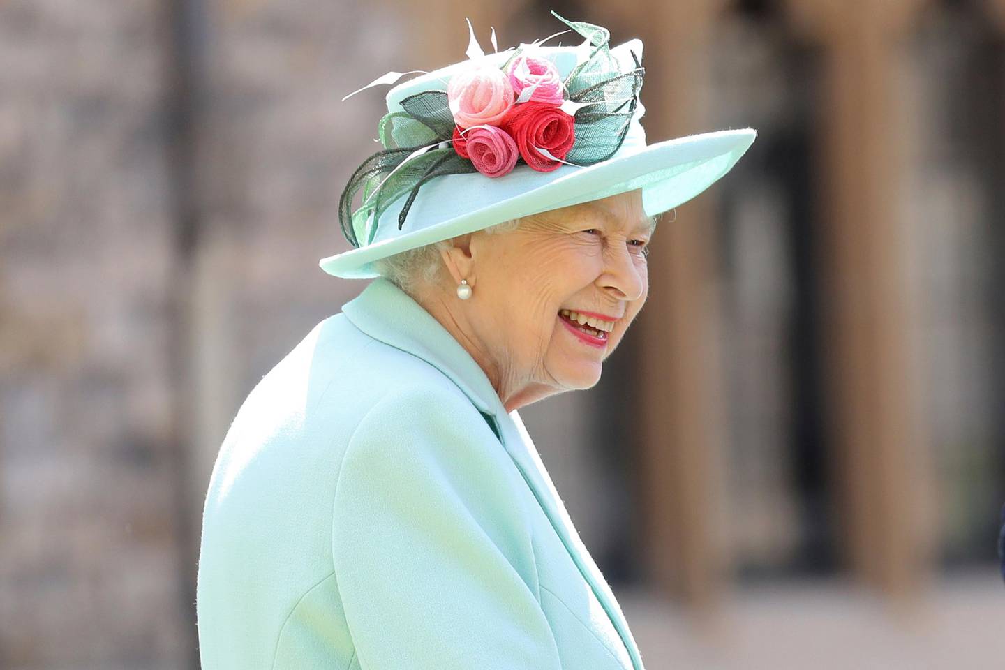 FILE - In this July 17, 2020 file photo, Britain's Queen Elizabeth smiles after awarding Captain Sir Thomas Moore his knighthood during a ceremony at Windsor Castle in Windsor, England. The former British colony of Barbador, once known as Little England, announced Tuesday, Sept. 15, that it plans to replace the monarch with its own head of state in time for next years 55th independence anniversary. (AP Photo/Chris Jackson, File)
