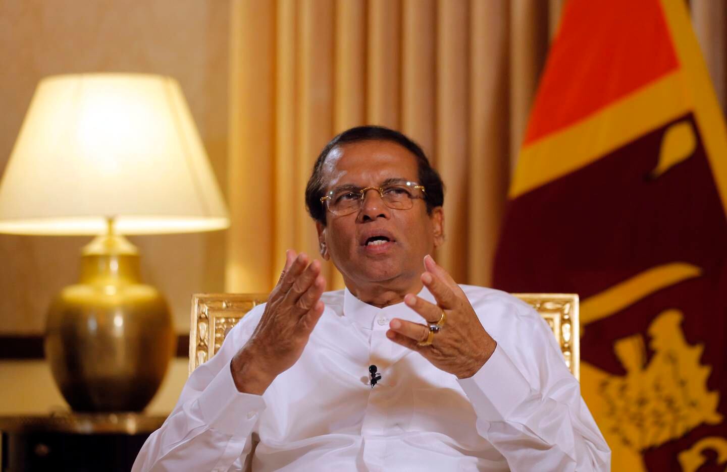Sri Lankan President Maithripala Sirisena speaks during an interview with the Associated Press at his residence in Colombo, Sri Lanka, Tuesday, May 7, 2019. Sirisena  says Äú99%Äù of the suspects in Easter Sunday attacks on churches and hotels have been arrested and their explosive materials seized. (AP Photo/Eranga Jayawardena)