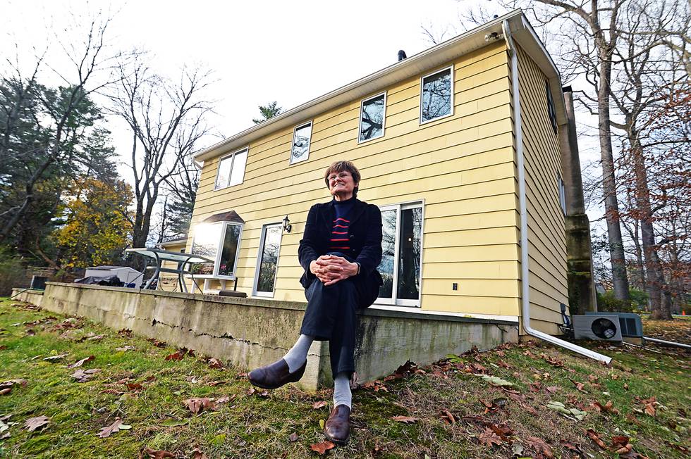 EXCLUSIVE: December 3, 2020 - Rydal, Pennsylvania, United States: Dr. Katalin Kariko, 65, the Hungarian born scientist whose work has become the cornerstone in the creation of the Covid-19 vaccine, outside her house. The pioneering scientist who fled Communist Hungary at 30 for the US in 1985 has spent 40 years of research into synthetic messenger RNA, long thought to be a boring dead-end. She said she was chronically overlooked, scorned, fired, demoted, repeatedly refused government and corporate grants, and threatened with deportation. Now, while others are earning billions, if you ask her what her cut is, she rolls her eyes with a rueful laugh and says, �maybe $3 million.� All along Kariko held fast to her belief in mRNA (Messenger ribonucleic acid), which has turned out to be key to building the complicated technology behind the new vaccines developed by Moderna and Germany�s BioNTech (which has teamed with Pfizer.) Scientists say they couldn�t have won the global vaccine race without her. Messenger ribonucleic acid, first discovered in 1961 at Caltech, has been called the �software of life.� Unlike other vaccines, which involve injecting dead viral remnants into the body, a vaccine using mRNA sends a set of instructions into cells that teaches � and triggers � them to fight off disease. It�s described as a clean vaccine � and the implications for preventing the spread of Covid and other diseases from cancer and strokes to malaria and multiple sclerosis is apparently off the charts. Legions of scientists, including many mRNA specialists, have helped develop the Moderna and BioNTech vaccines. But it was Kariko � with the help of University of Pennsylvania immunologist Drew Weissman � who discovered a method in 2005 to prevent the inflammatory response in the body to synthetic mRNA. That simple modification paved the way for both the BioNTech and Moderna vaccines. (Matthew McDermott/Polaris)