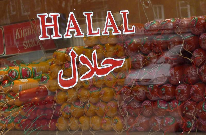 Halal butcher store in Amsterdam, Netherlands, Thursday March 31, 2011. The Dutch parliament may soon pass a law banning centuries-old Jewish and Muslim traditions on the ritual slaughter of cows, sheep and chickens. If the Netherlands does outlaw procedures that make meat kosher for Jews or Halal for Muslims, it will be the first country outside of New Zealand to do so in recent years. (AP Photo/Peter Dejong)