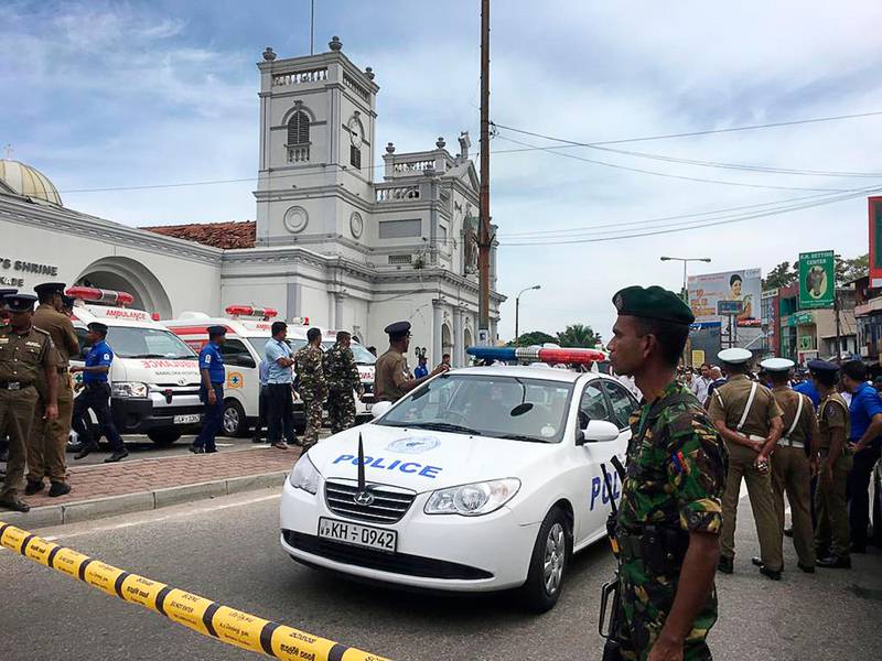 ADDS THE NAME OF CHURCH - Sri Lankan Army soldiers secure the area around St. Anthony's Shrine after a blast in Colombo, Sri Lanka, Sunday, April 21, 2019. Witnesses are reporting two explosions have hit two churches in Sri Lanka on Easter Sunday, causing casualties among worshippers. (AP Photo/Eranga Jayawardena)