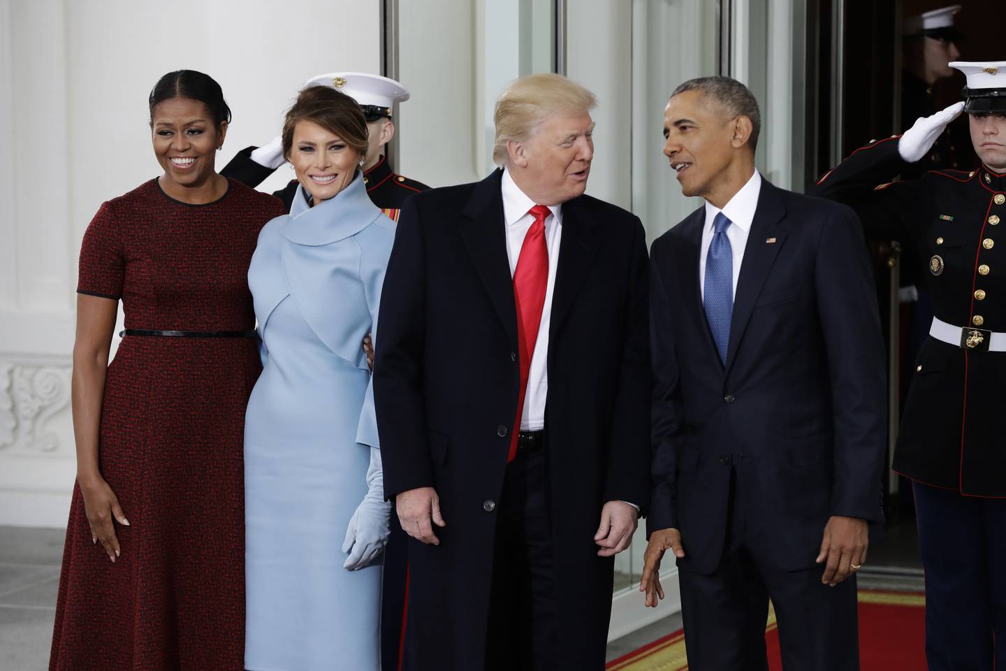 In a Friday, Jan. 20, 2017 file photo, President Barack Obama and first lady Michelle Obama pose with President-elect Donald Trump and his wife Melania at the White House in Washington. Before he left office in January, President Barack Obama offered his successor accolades and advice in a private letter that underscored some of his concerns as he passed the baton.  In the letter, published Sunday, Sept. 3, 2017, by CNN, Obama urged President Donald Trump to ?Äúbuild more ladders of success for every child and family,?Äù to ?Äúsustain the international order?Äù and to protect ?Äúdemocratic institutions and traditions.?Äù(AP Photo/Evan Vucci, File)