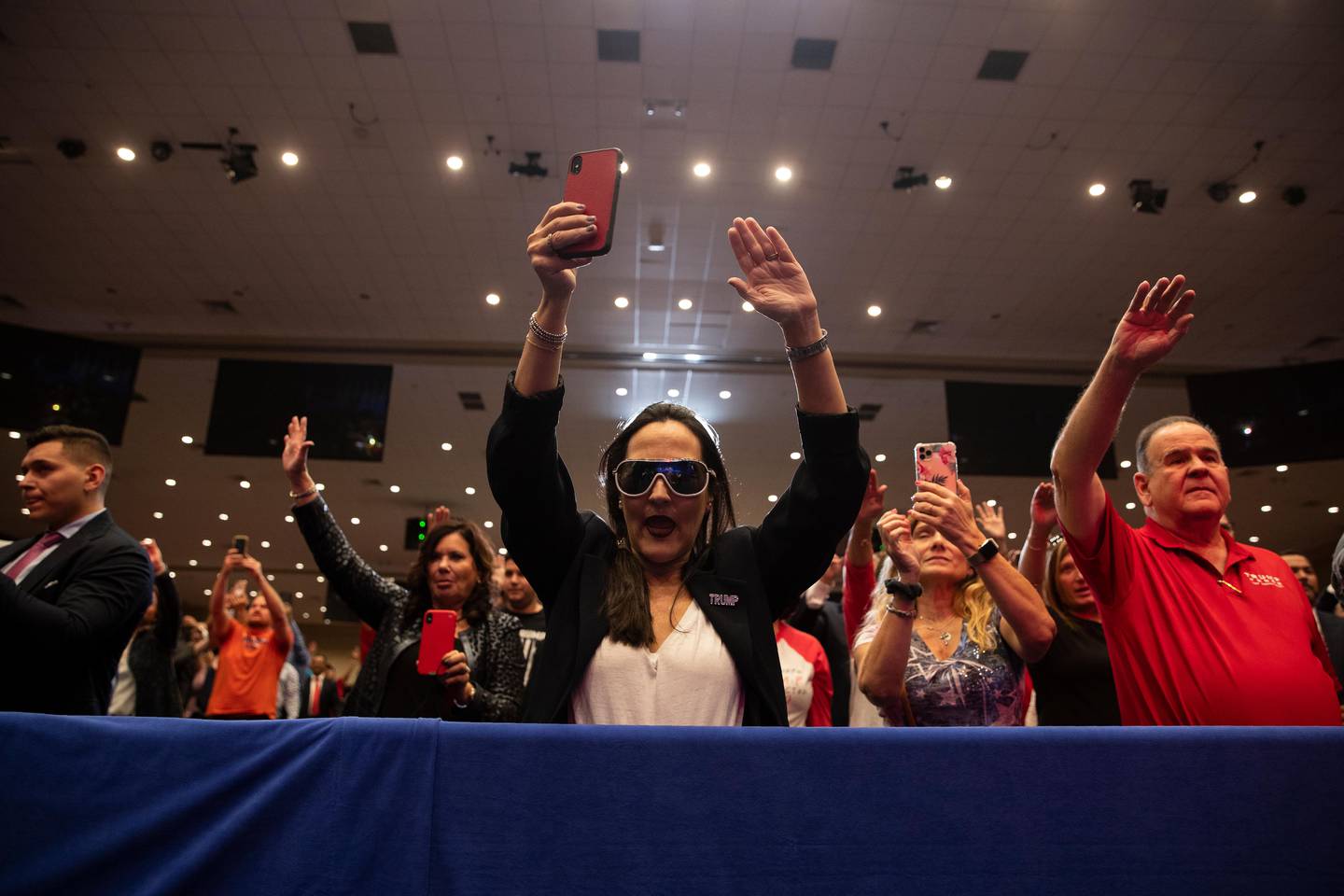 Supporters of President Donald Trump pray during an "Evangelicals for Trump Coalition Launch" at King Jesus International Ministry, Friday, Jan. 3, 2020, in Miami. (AP Photo/ Evan Vucci)