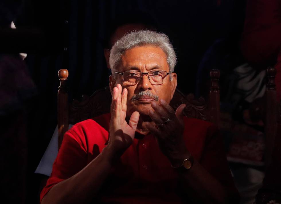 FILE- In this Nov. 13, 2019, file photo, Sri Lanka's former defense secretary and presidential candidate Gotabaya Rajapaksa attends a rally in Homagama, on the outskirts of Colombo, Sri Lanka. Rajapaksa is credited with helping end the countrys long civil war and is revered as a hero by the Sinhalese Buddhist majority. He comfortably won Saturdays presidential election with about 52% of the ballots. But minorities largely voted for his opponent, fearing Rajapaksa because of allegations of wartime human rights violations against him. (AP Photo/Eranga Jayawardena, File)
