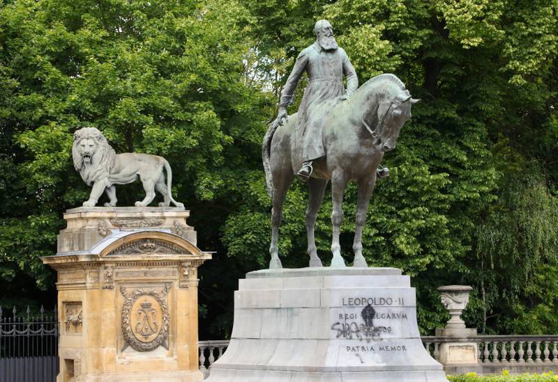 A statue of Belgium's King Leopold II is defaced with the words 'shame' prior to a Black Lives Matter protest rally in Brussels, Sunday, June 7, 2020. The demonstration was held in response to the recent killing of George Floyd by police officers in Minneapolis, USA, which has led to protests in many countries and across the US. (AP Photo/Olivier Matthys)