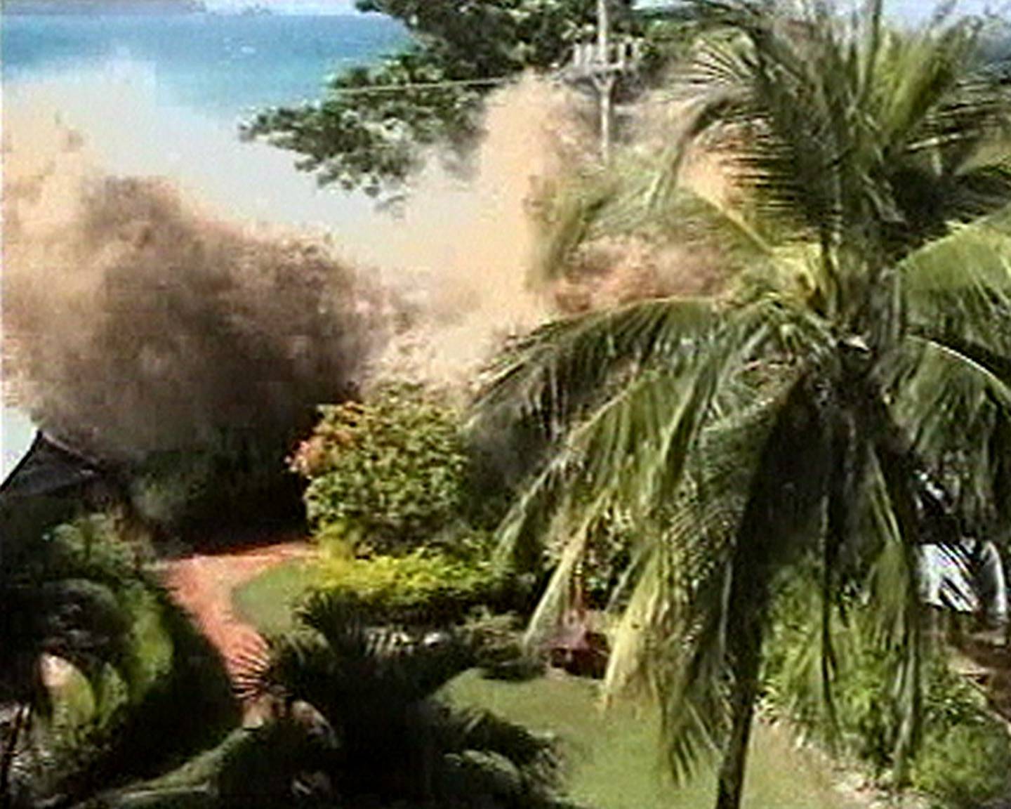 Still image made from an amateur video, shot by a British family vacationing at Thailand's Phuket resort, of the tidal wave coming ashore Sunday, Dec. 26, 2004. The video of the tsunami, sparked by Sunday's earthquake off the coast of Indonesia's Sumatra island,  was filmed from the balcony of the family's hotel on the resort's Patong Beach.  (AP Photo / APTN) ** TV OUT **